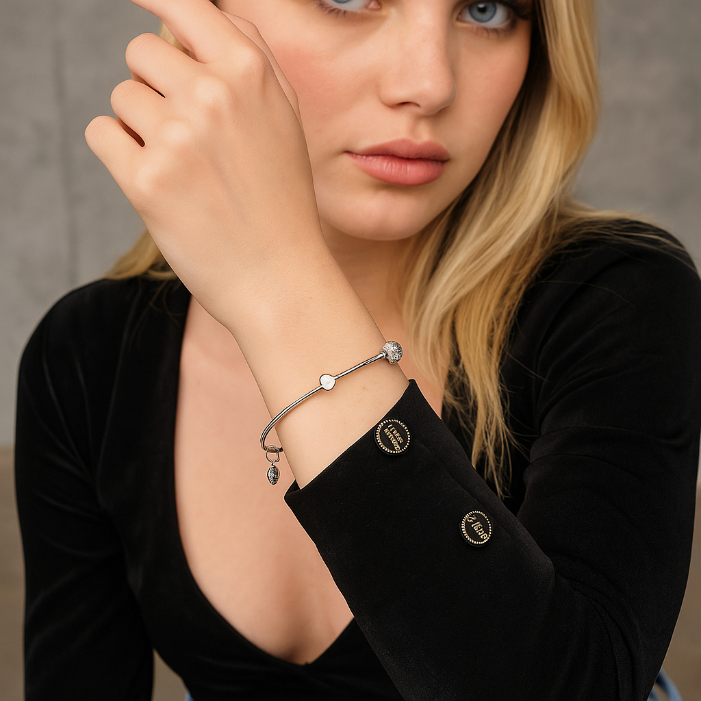 Women's ball and charms bracelet in silver colour
