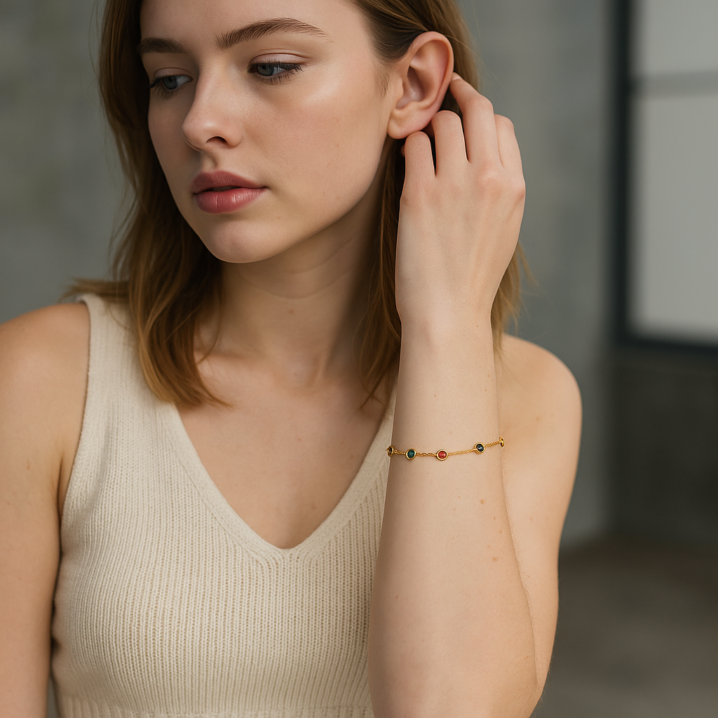 Woman wearing a 18k Gold Plated bracelet with colorful beads, looking at herself in a mirror.