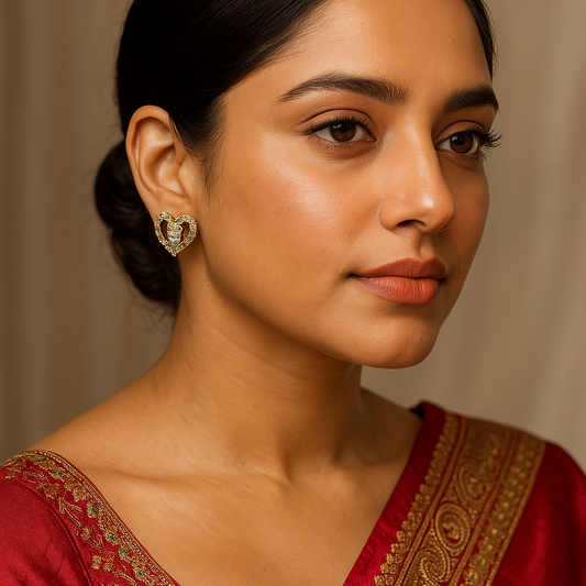 Woman wearing a red and gold traditional outfit with a neutral background