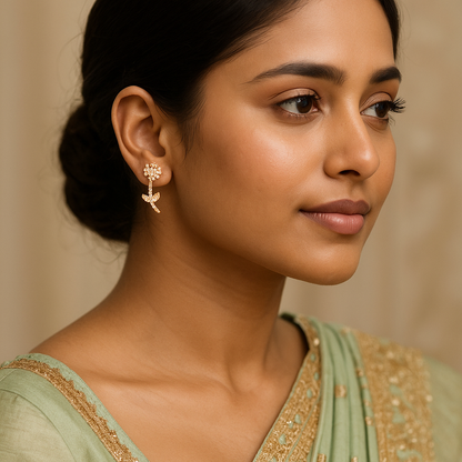 Woman wearing earrings with a neutral background