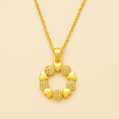 Gold necklace with a heart-shaped pendant on a beige background