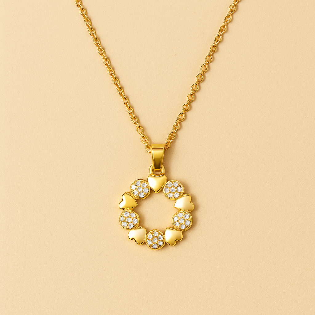 Gold necklace with a circular pendant on a beige background