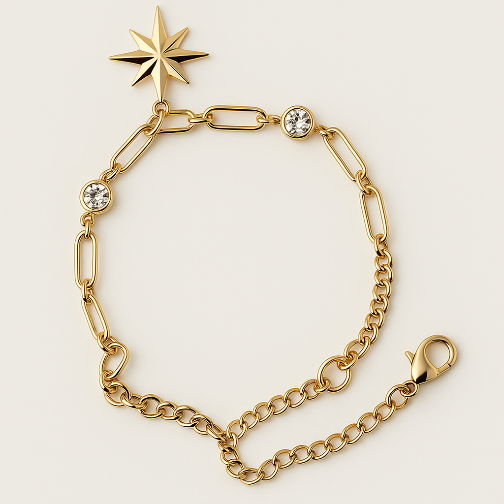 Gold bracelet with star-shaped clasp on a light beige background