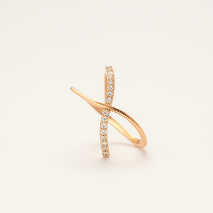 Rose gold ring with diamond accents on a light beige background