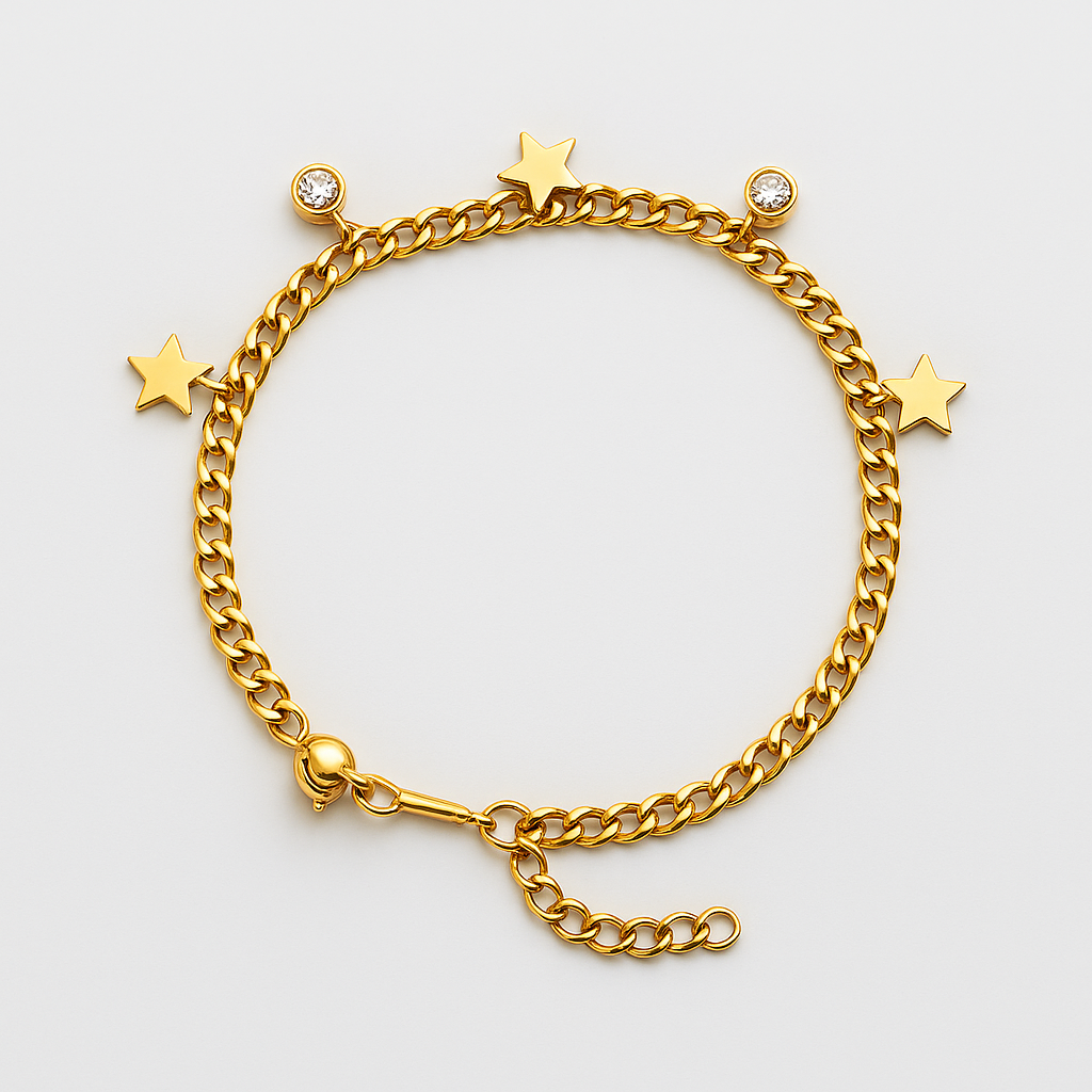 Gold chain bracelet with star and heart charms on a light gray background
