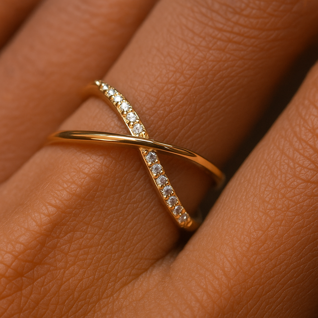 Gold ring with diamonds on a person's finger