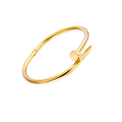 A 18k plated gold nail bangle bracelet with a simple yet elegant design.