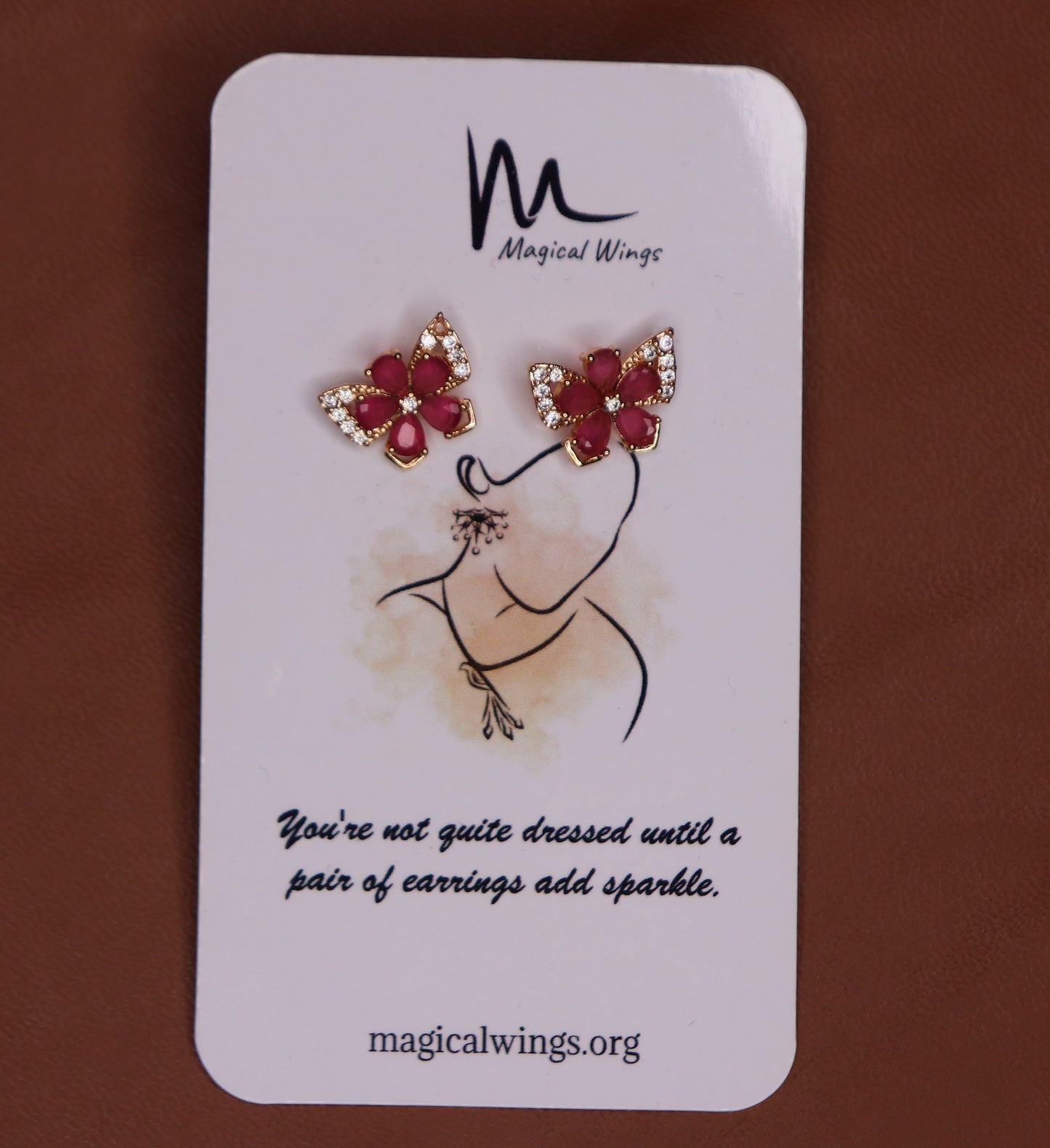 A pair of indian butterfly stud earrings featuring a butterfly design with red and pink wine glasses, from Magical Wings.