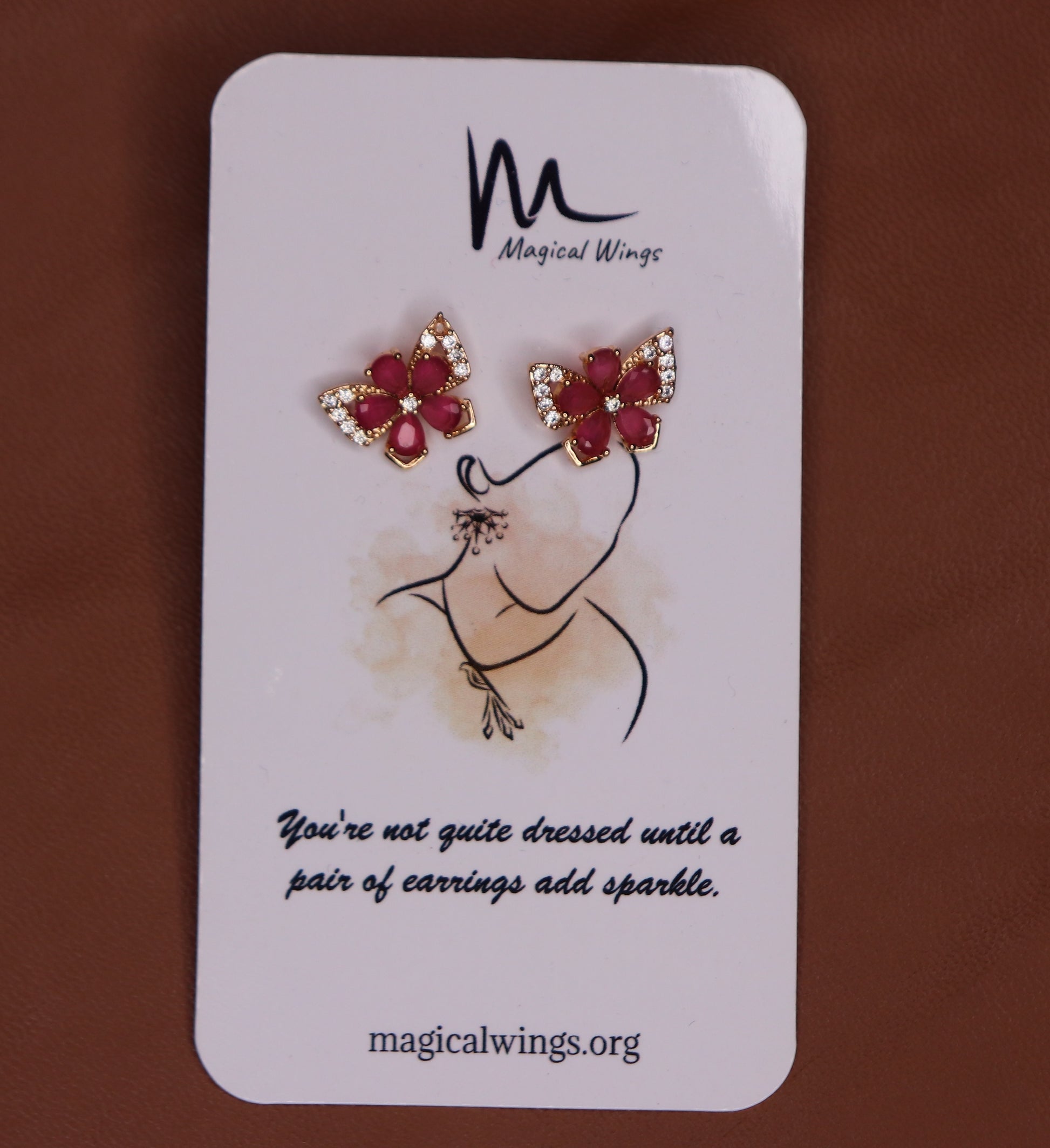 A pair of indian butterfly stud earrings featuring a butterfly design with red and pink wine glasses, from Magical Wings.