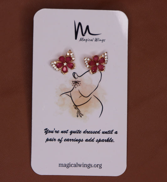 A pair of indian butterfly stud earrings featuring a butterfly design with red and pink wine glasses, from Magical Wings.