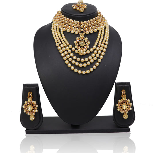 A choker necklace set displayed on a mannequin, featuring multiple layers of golden beads and crystal embellishments, accompanied by matching earrings.