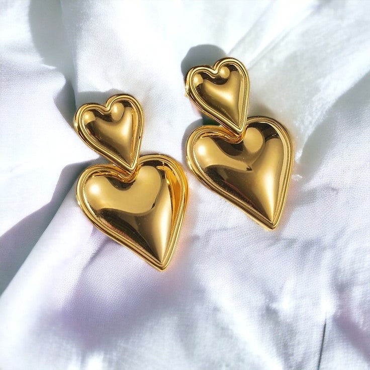A pair of 18K heart shaped gold plated drop earring