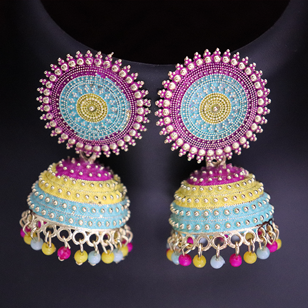 A pair of multicolored meenakari jhumka earrings with geometric patterns and pearl embellishments.