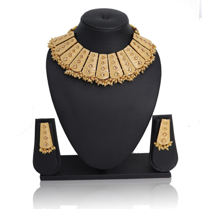 A Necklace set with a golden-colored beaded chain and matching earrings displayed on a black stand.